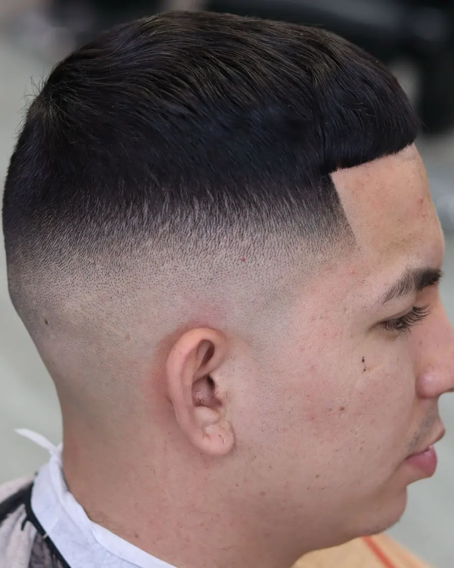 Mid skin fade with sharp line-up